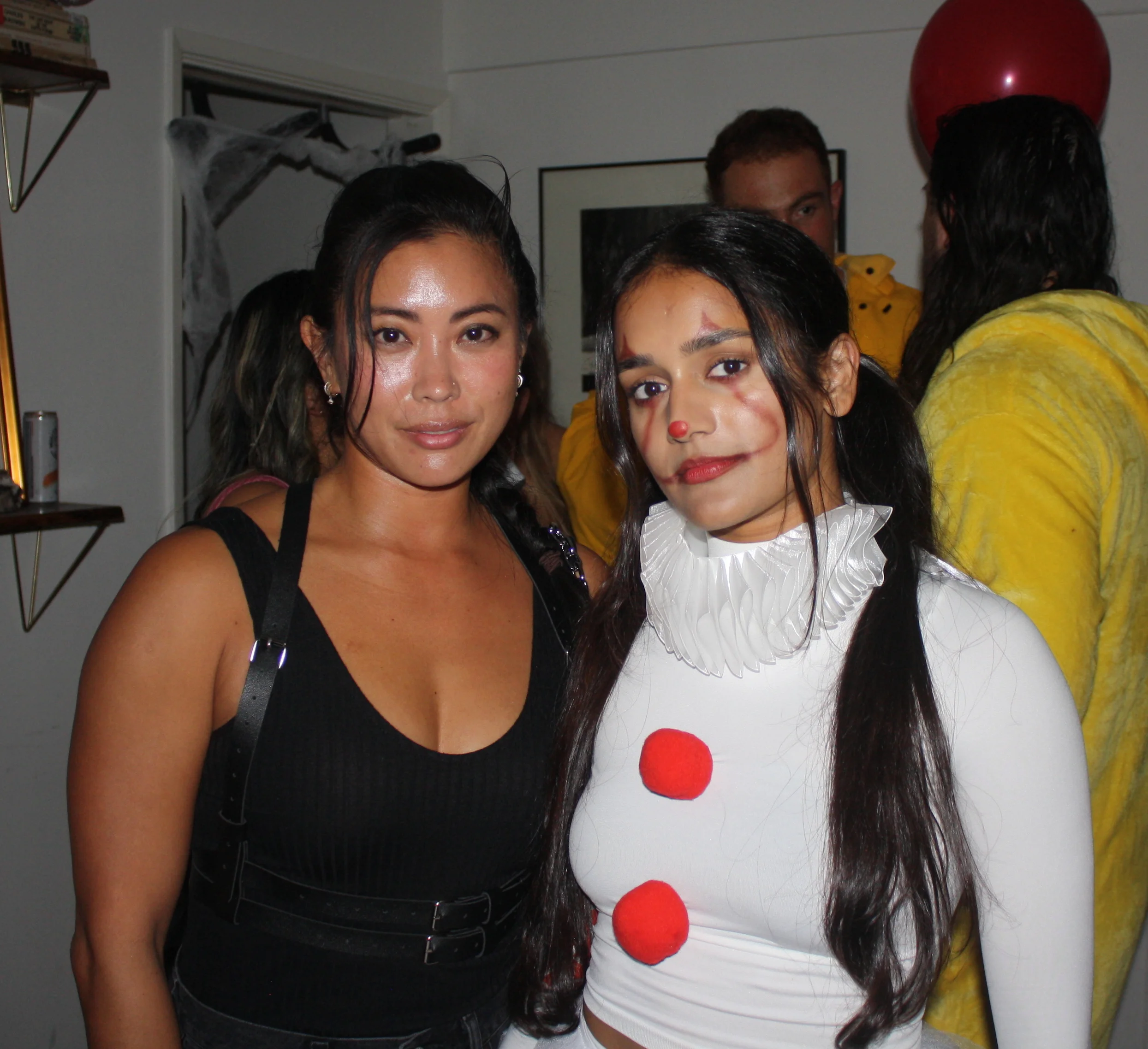 Friends dressed as Pennywise and Lara Croft